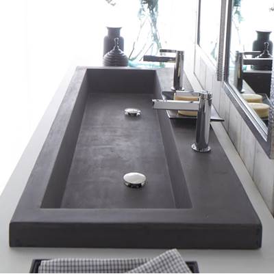 Slate-colored rectangular trough sink with no faucet holes, displayed in modern bathroom vanity with mirror.