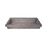 Rectangular gray concrete trough sink with sloped sides and single drain hole, no faucet holes.