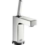 Chrome single-lever bathroom faucet with tall rectangular spout and vertical handle.