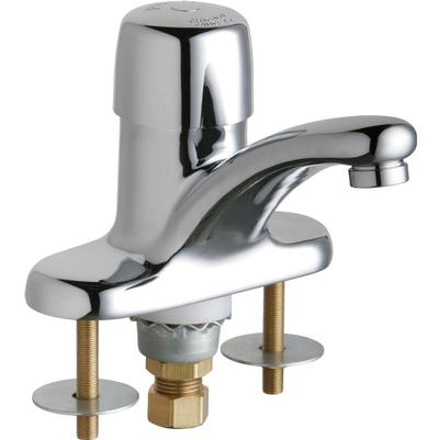 Chrome single-handle metering sink faucet with curved spout and brass supply lines on deck plate.