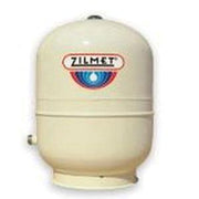 Almond-colored cylindrical thermal expansion tank with Zilmet logo and flat base for floor mounting.
