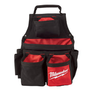 Black and red carpenter's pouch with multiple pockets, handle, and Milwaukee branding on front pocket.