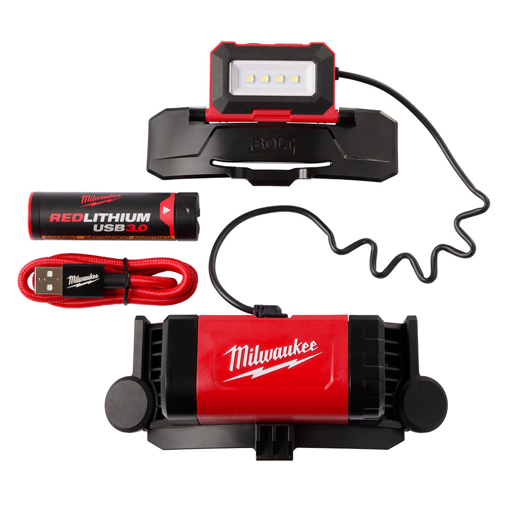 Red and black Milwaukee BOLT headlamp with four LED lights, USB cable, rechargeable battery, and charging dock displayed sepa