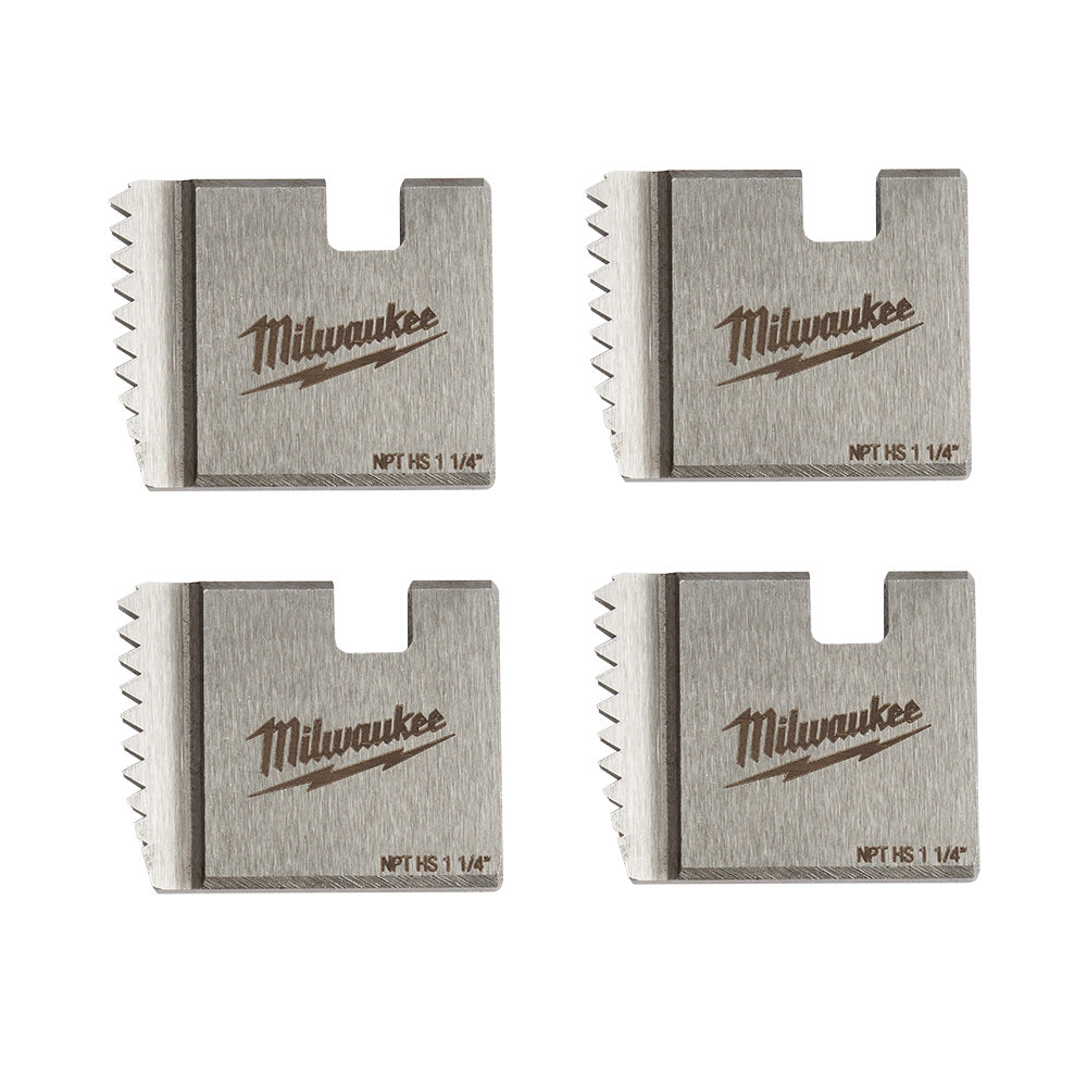 Four Milwaukee NPT HS 1 1/4" threading dies with metal bodies and cutting grooves on sides.