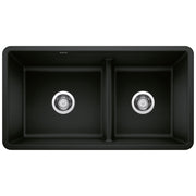 Coal black double bowl kitchen sink with low divide and chrome drain fixtures.