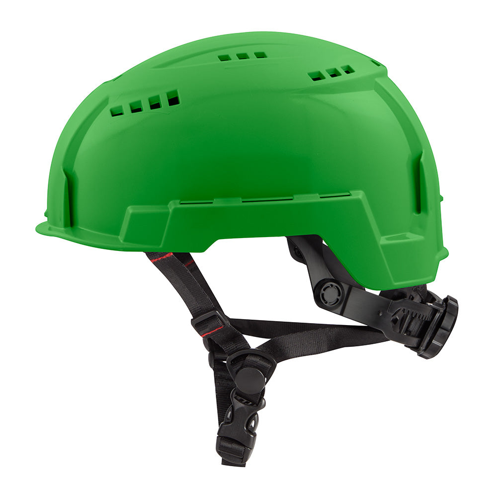 Green vented safety helmet with black chin strap and ventilation slots across the crown.