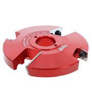 Red router cutter head with four cutting edges and central bore, mounted with carbide inserts.