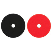 Two 5-inch foam polishing pads, one black and one red, each with a center hole.