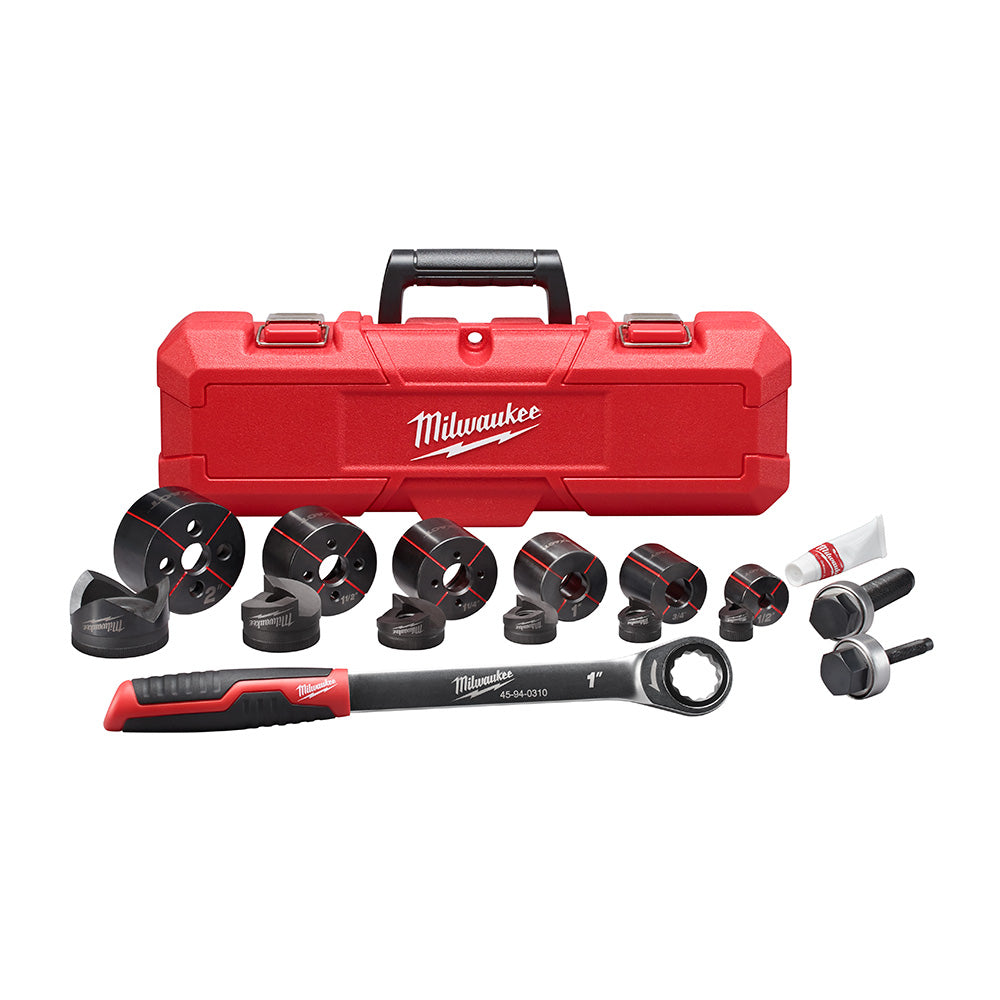 Milwaukee hand ratchet knockout set in red carrying case with multiple black knockout dies and tools.