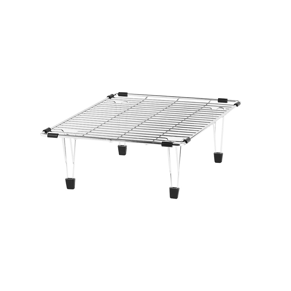 Stainless steel sink grid with parallel wire construction, black corner clips, and clear rubber feet for elevation.