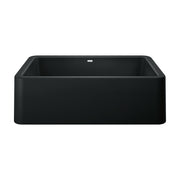 Coal black single bowl farmhouse sink with apron front and rounded corners, viewed from above.