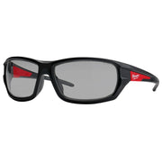 Black safety glasses with gray lenses and red accents on the arms, Milwaukee branding visible.