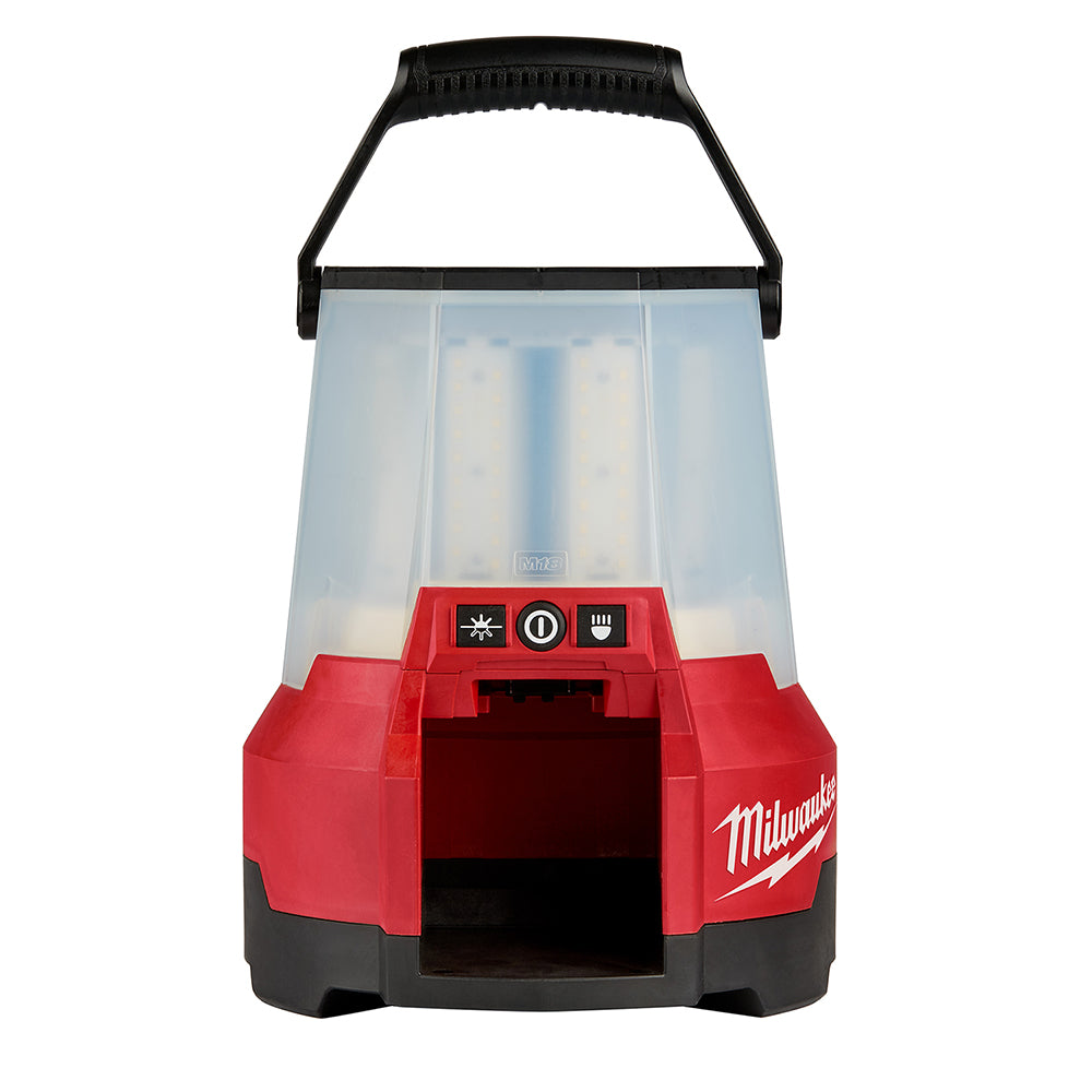 Red and black Milwaukee M18 RADIUS LED compact site light with clear cylindrical shade and black carry handle.
