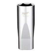 Polished metal deep socket with Milwaukee branding and model number, hexagonal opening at top, 24mm size marked on side.