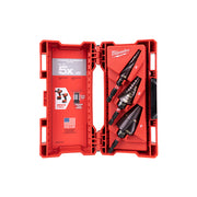 Three black Milwaukee Shockwave step bits with fluted shanks in open red carrying case.