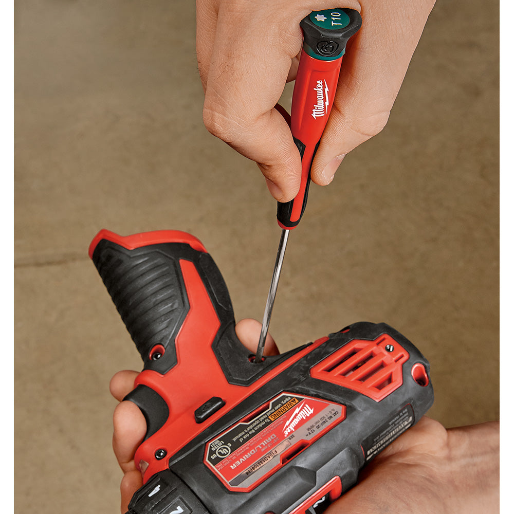 Milwaukee red and black Torx precision screwdriver set with storage case and multiple driver bits displayed.