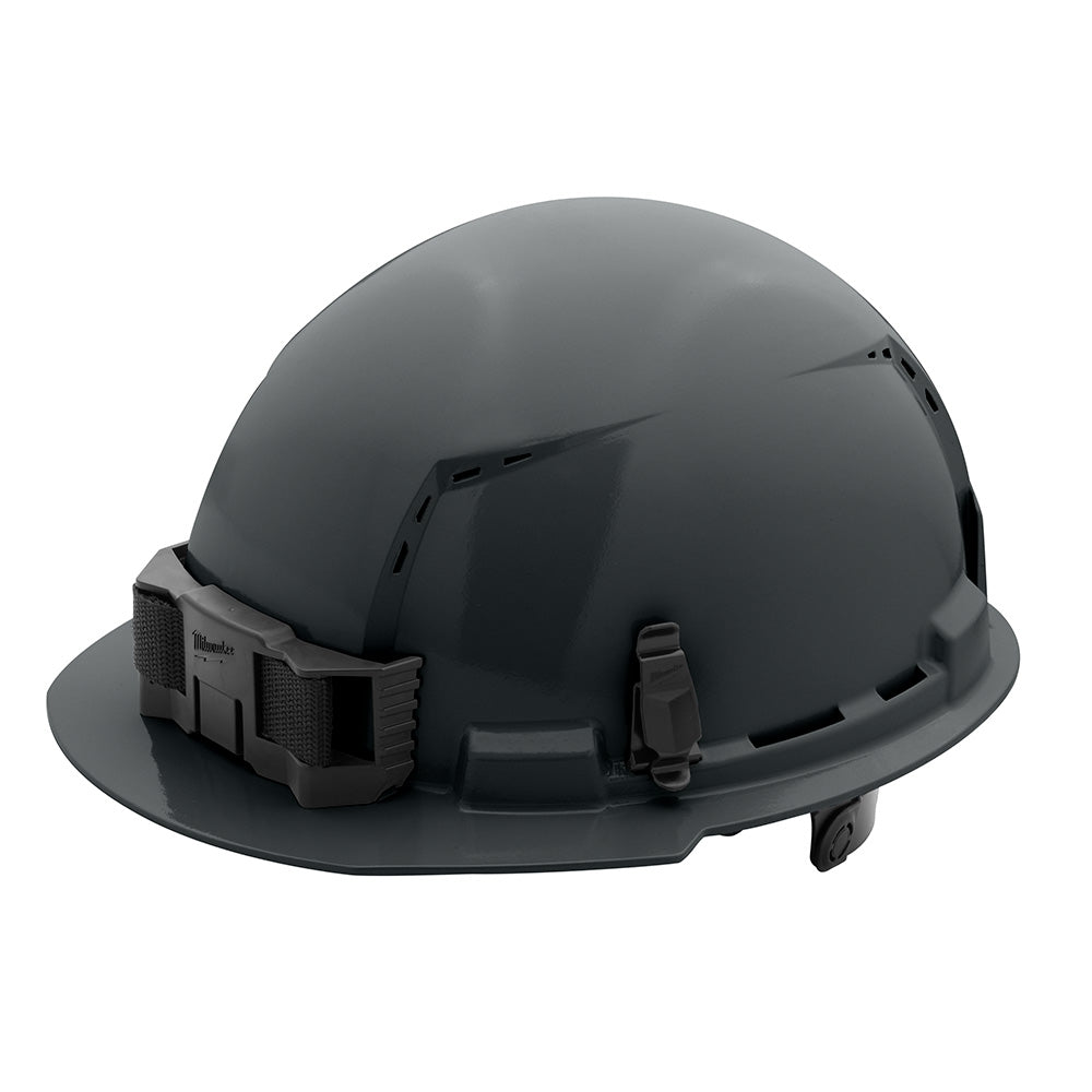 Gray hard hat with front brim, vented crown, and ratcheting suspension system visible on sides.