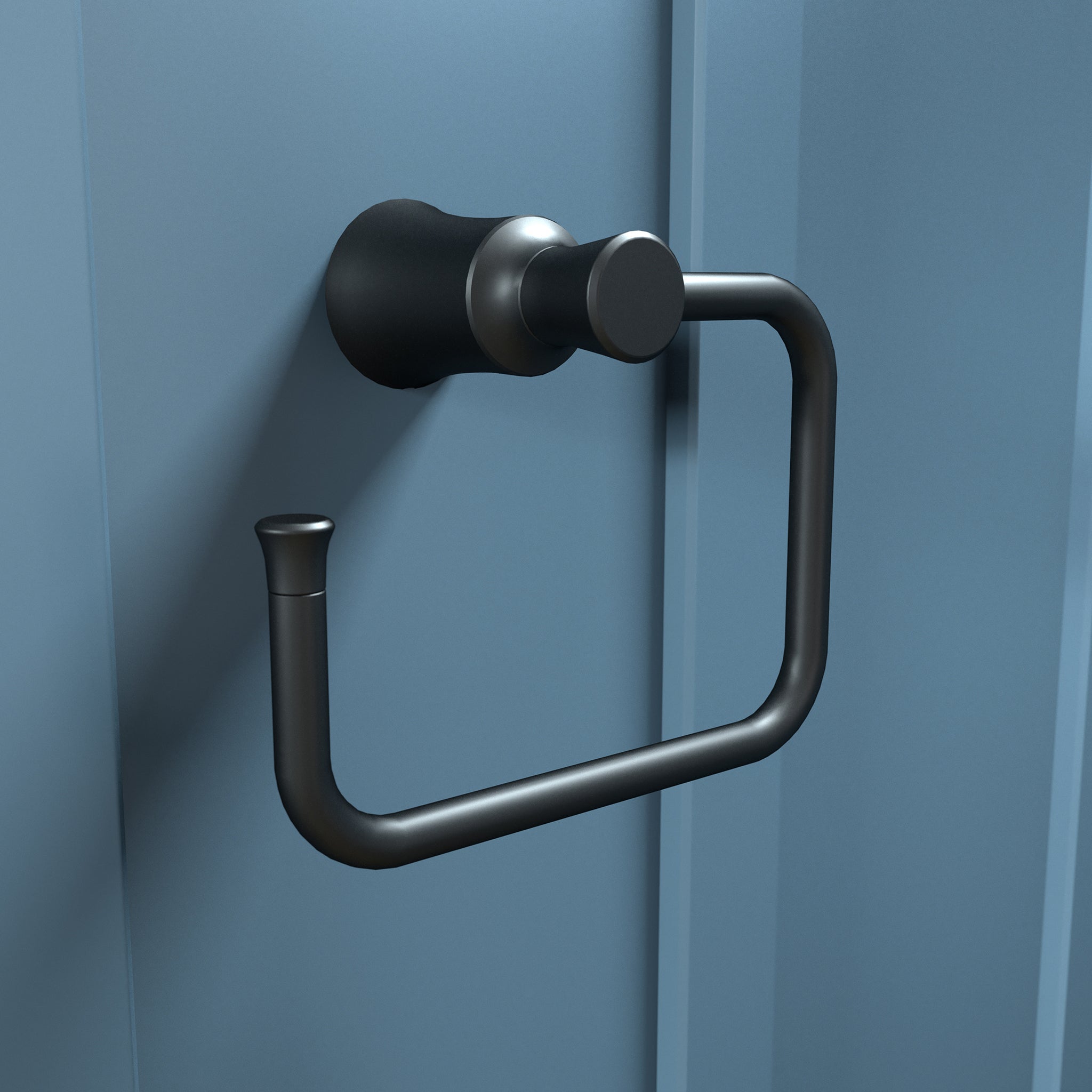 Matte black towel ring with cylindrical mounting bracket and curved rectangular loop mounted on blue wall.