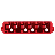 Red plastic organizer insert with four compartments and white circular holes for bit storage.