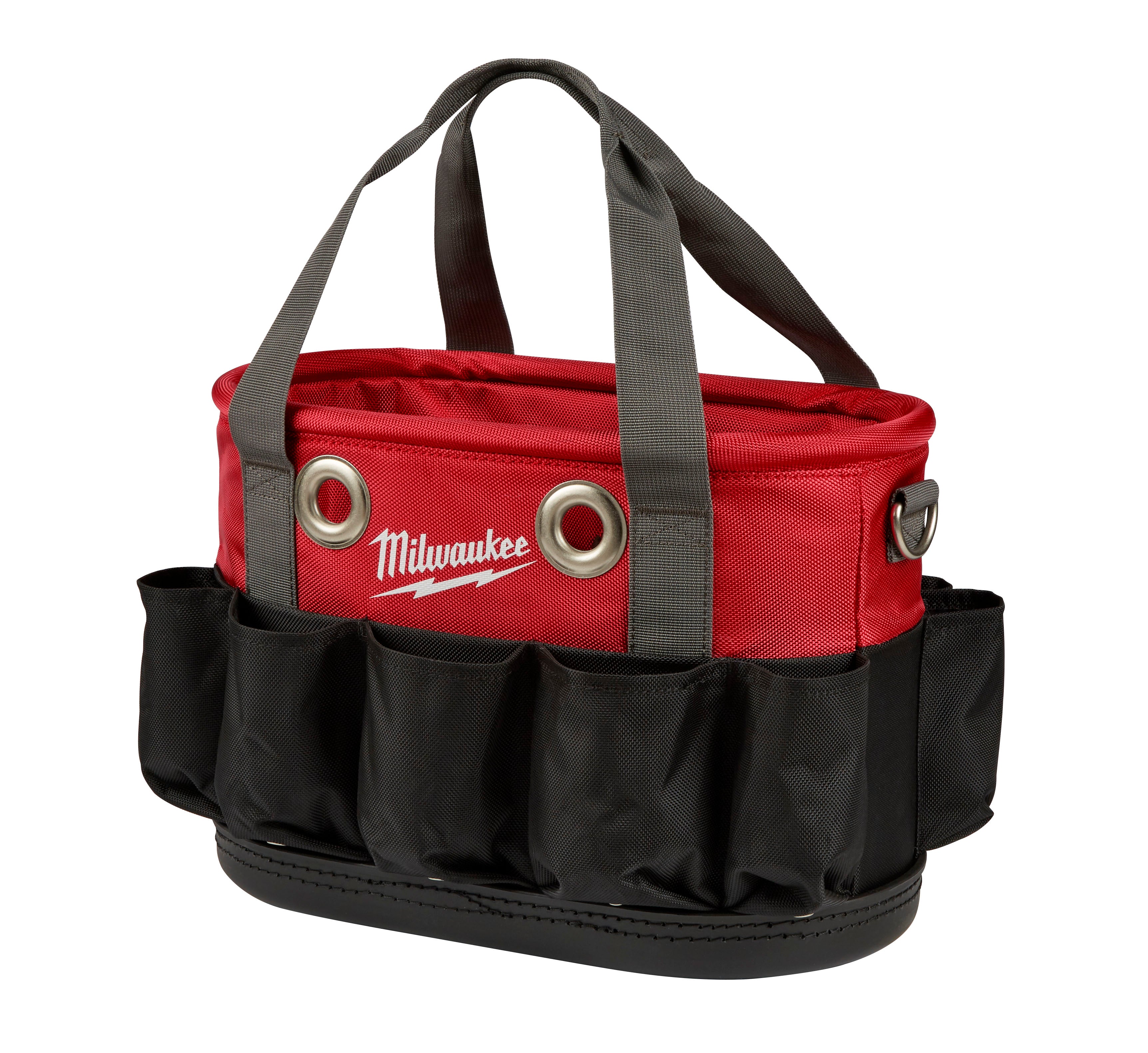 Red and black oval tool bag with gray handles, Milwaukee branding, metal grommets, and exterior pockets.