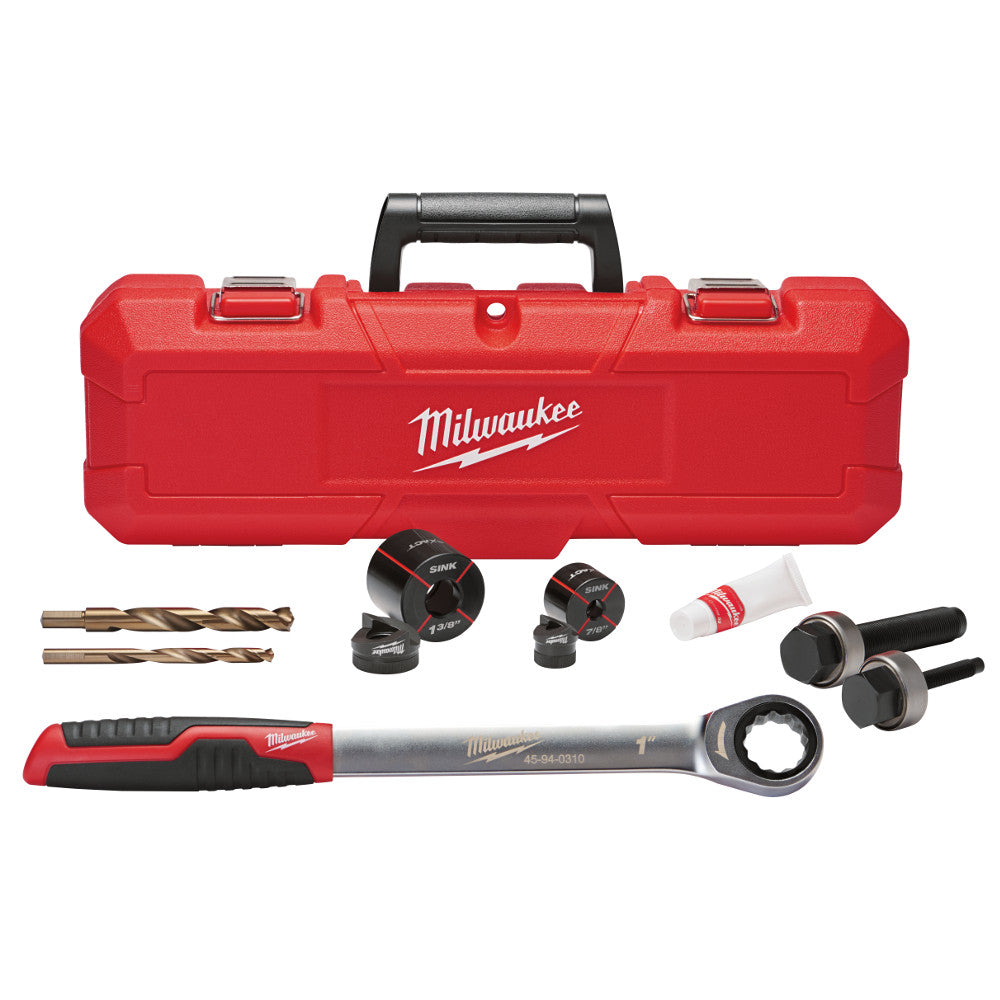 Milwaukee EXACT sink knockout set with red carrying case containing drill bits, knockout punches, guide tools, and ratchet wr