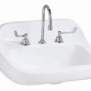White wall-hung bathroom sink with chrome faucet and dual lever handles.