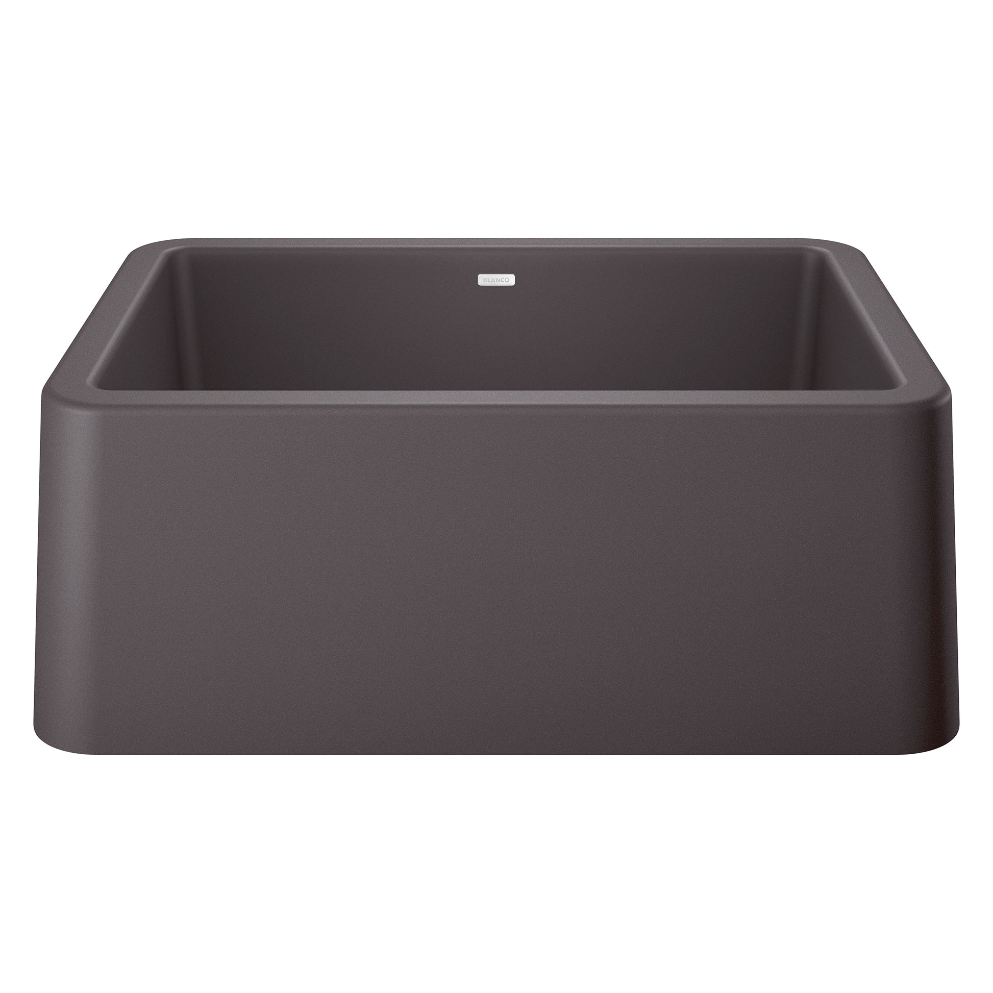 Cinder-colored single bowl farmhouse sink with apron front and rounded corners, viewed from above at an angle.