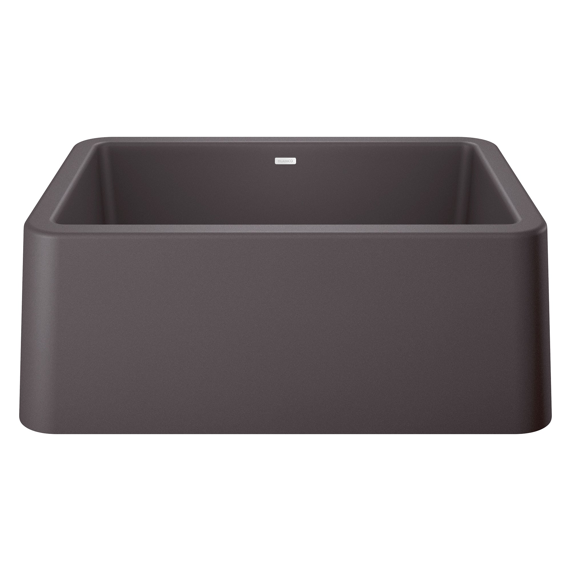 Cinder-colored single bowl farmhouse sink with apron front and rounded corners, viewed from above at an angle.