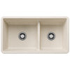 White composite sink with two equal basins and low center divider.
