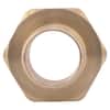 Hexagonal brass connector fitting with center hole, male threaded end.