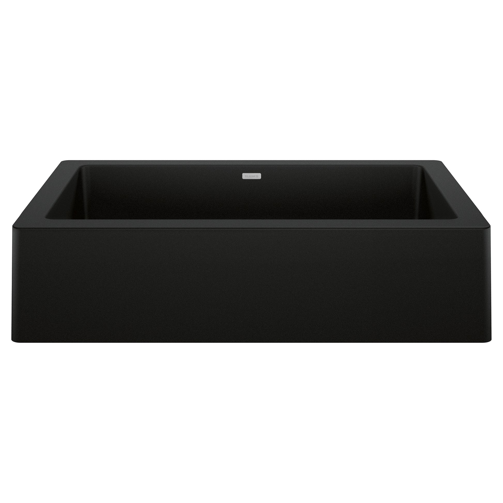Coal black apron farmhouse sink with single rectangular basin and sloped front edges.