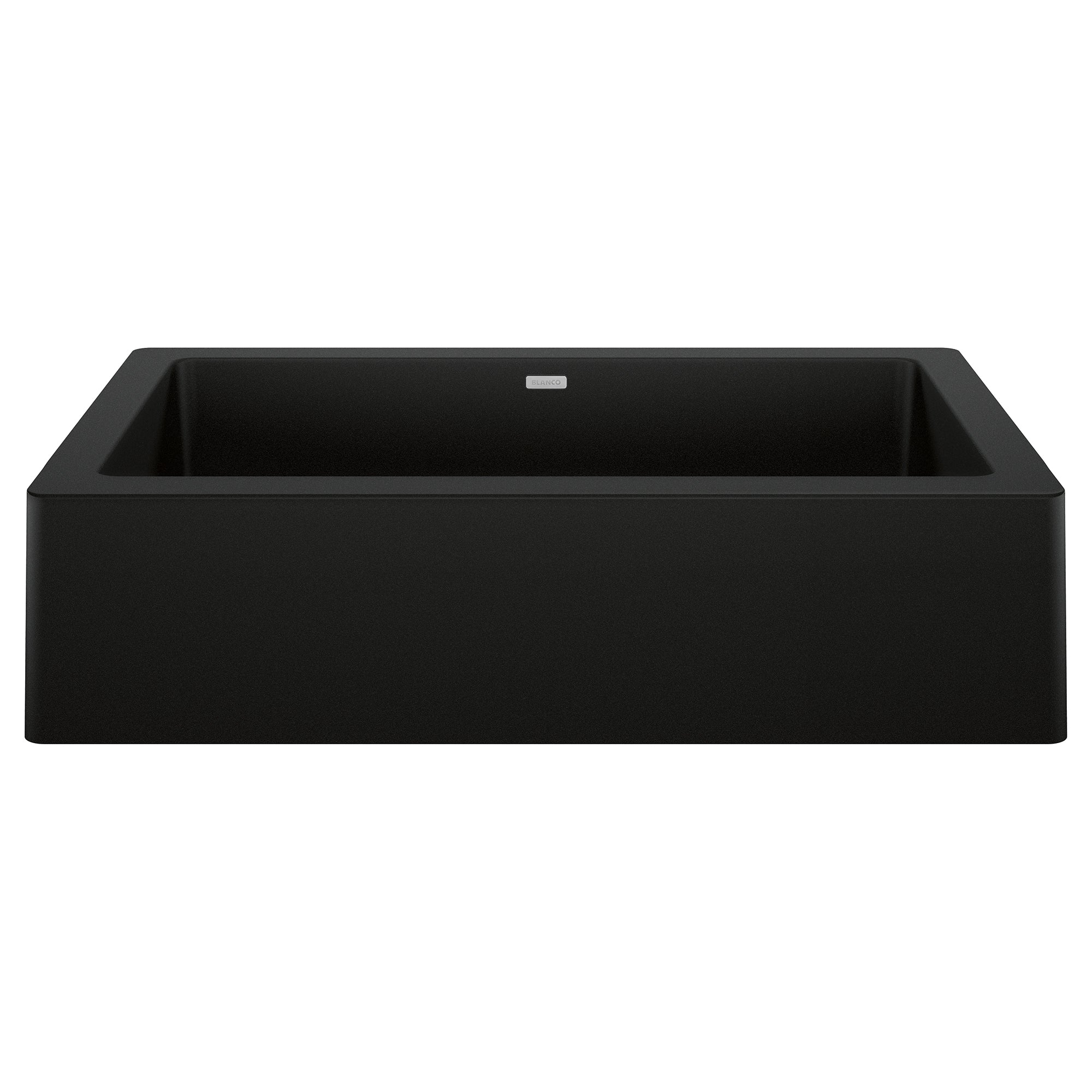 Coal black apron farmhouse sink with single rectangular basin and sloped front edges.