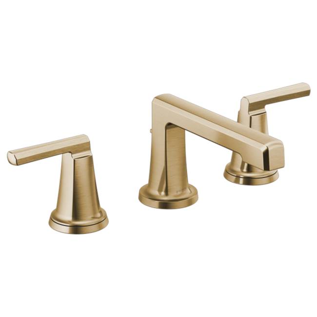 Brushed gold widespread lavatory faucet with low spout and single lever handles on each side.