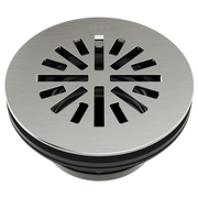 Round brushed nickel shower drain with radial slot pattern and black rubber ring seal.