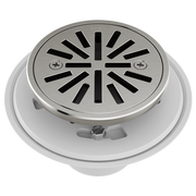 Round shower drain with brushed nickel grate and radial slot pattern, white flange visible below.