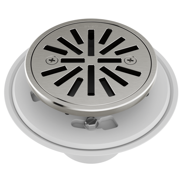 Round shower drain with brushed nickel grate and radial slot pattern, white flange visible below.