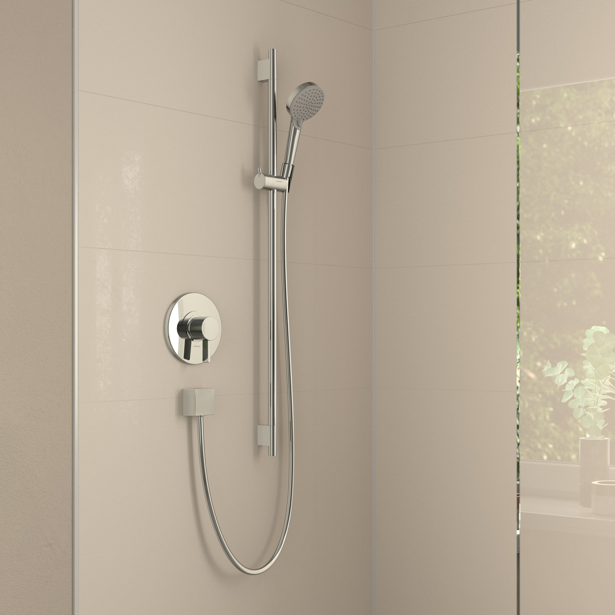 Chrome handshower with perforated head mounted on vertical rail with round wall-mounted control valve.