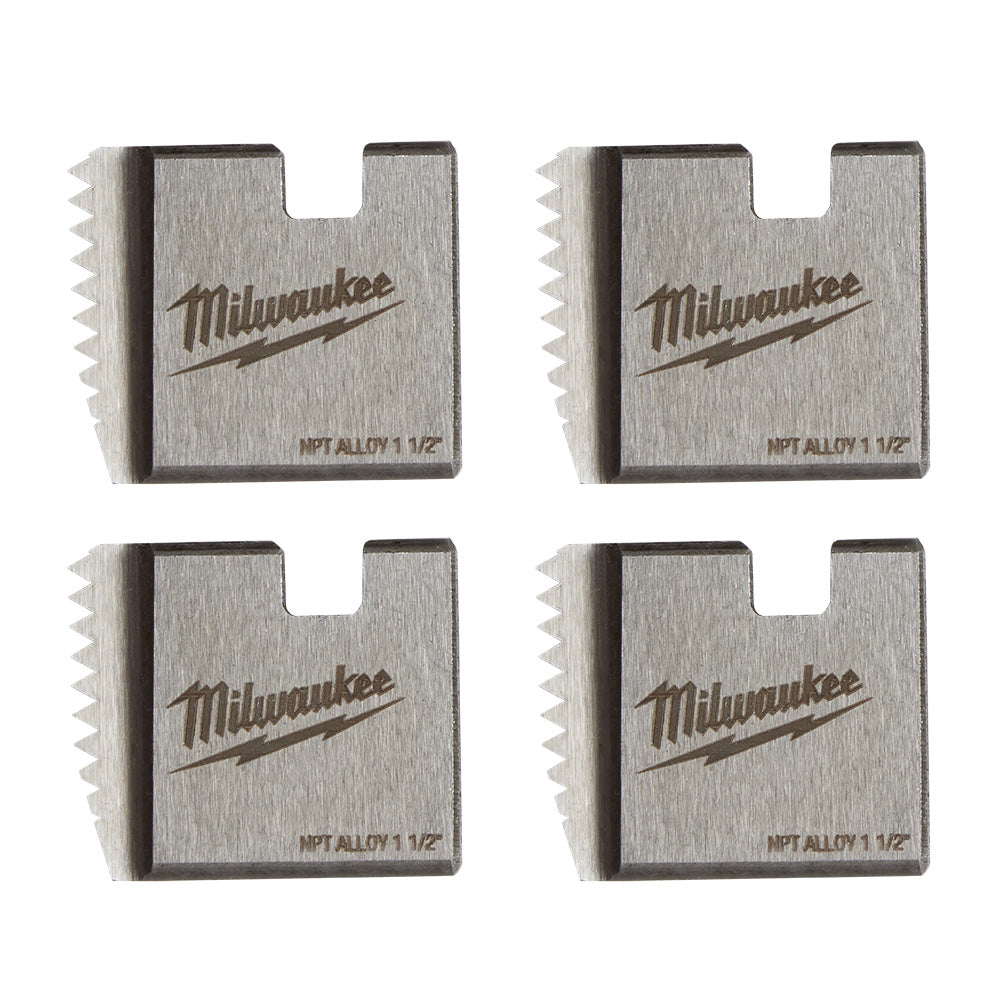 Four metallic alloy pipe threading dies with serrated edges and Milwaukee branding, labeled NPT ALLOY 1 1/2.