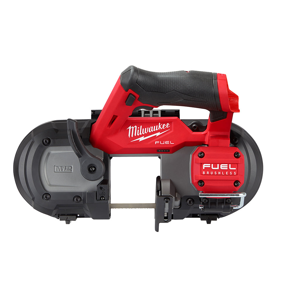 Milwaukee M12 FUEL compact band saw with red and black housing, black rubber grip handle, and circular cutting wheel visible 