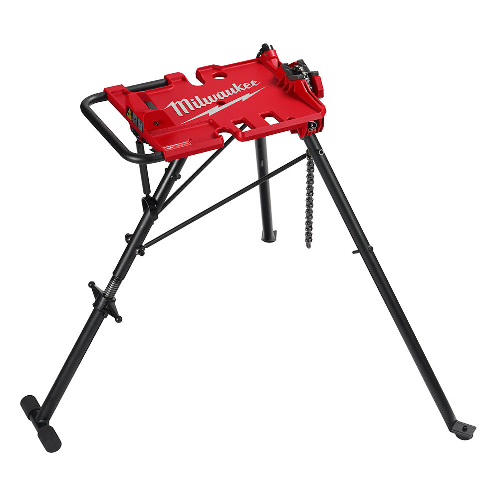 Red and black Milwaukee portable leveling tripod chain vise with adjustable legs and clamping mechanism.