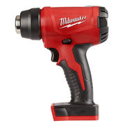 Red and black Milwaukee M18 compact heat gun with pistol grip and round nozzle attachment.