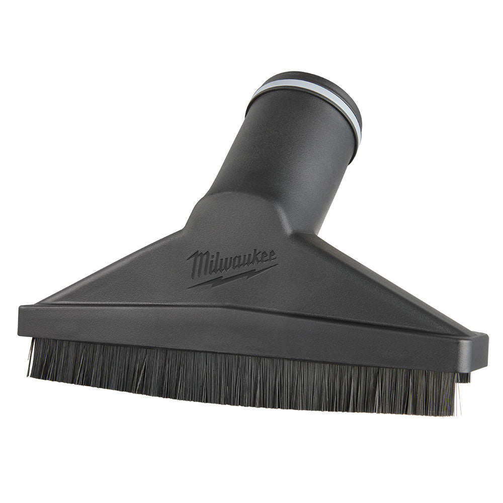 Black Milwaukee floor brush tool with angled head, cylindrical handle, and synthetic bristles along bottom edge.