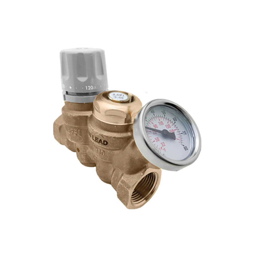 Brass Y-strainer with sweat connections, integral pressure gauge, and gray adjustment cap on top.
