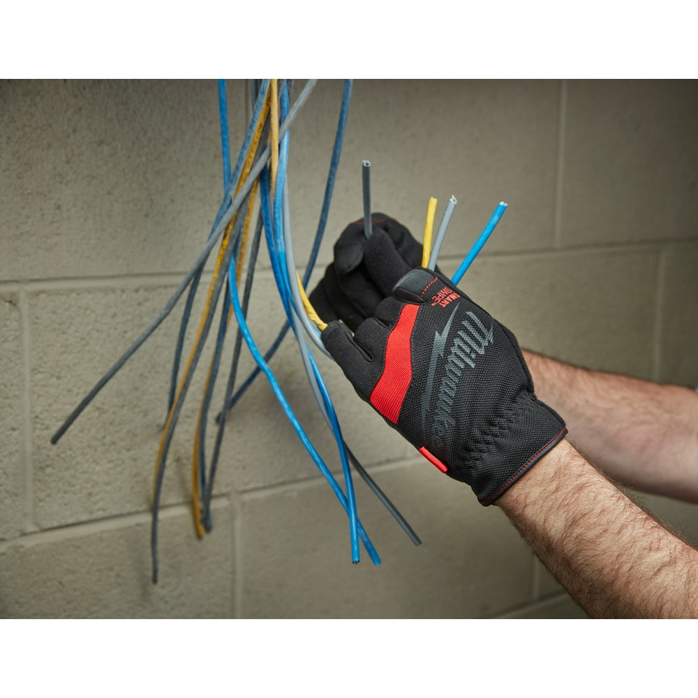 Black and red work glove with mesh panels worn on hand holding multiple colored electrical wires.