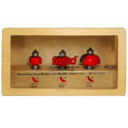 Three red cove router bits with black shanks in a wooden storage case with specifications and item number 89-550.