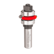 Freud 1/8" radius flute bit with silver shank, red bearing ring, and hex collet chuck assembly.