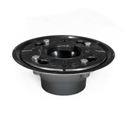 Black circular drain body with central opening, threaded center hole, and mounting points around the flange.