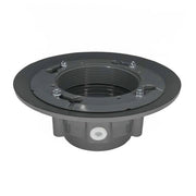 Dark gray drain body with threaded center opening and bonded flange base, four mounting holes visible.