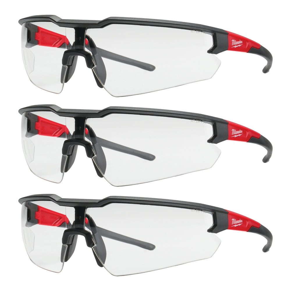 Three safety glasses with clear lenses, black frames, red temples, and gray nose bridges stacked vertically.