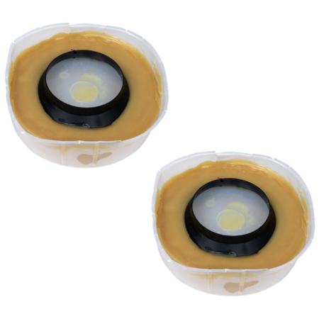 Two tan wax toilet gasket rings with black rubber flanges in clear plastic packaging.